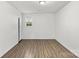 Empty bedroom with neutral walls and wood-look flooring at 4304 S Falls St, Gastonia, NC 28056