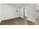 Bedroom with neutral walls and wood-look flooring at 4304 S Falls St, Gastonia, NC 28056