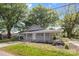 Charming single-story home with a covered front porch and green lawn at 4304 S Falls St, Gastonia, NC 28056