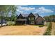 Beautiful home with large windows, a screened porch, and a spacious backyard at 4377 Kiser Island Rd, Terrell, NC 28682