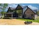 Charming home with large windows, a screened porch, and a large backyard at 4377 Kiser Island Rd, Terrell, NC 28682