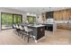 Modern kitchen featuring dual islands, designer lighting, and ample space for dining and entertaining at 4377 Kiser Island Rd, Terrell, NC 28682