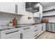 Modern kitchen features black hardware, granite countertops, and stainless steel appliances at 4377 Kiser Island Rd, Terrell, NC 28682