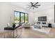 Bright living room with a large window, stylish furniture, and light hardwood floors at 4377 Kiser Island Rd, Terrell, NC 28682