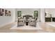 Cozy primary bedroom with hardwood floors, sitting area, and neutral decor at 4377 Kiser Island Rd, Terrell, NC 28682