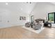 Spacious primary bedroom with vaulted ceiling, hardwood floors, and neutral decor at 4377 Kiser Island Rd, Terrell, NC 28682