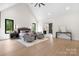 Spacious primary bedroom with vaulted ceiling, hardwood floors, and neutral decor at 4377 Kiser Island Rd, Terrell, NC 28682