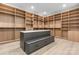 Spacious walk-in closet with custom built-in shelves and an island with drawers at 4377 Kiser Island Rd, Terrell, NC 28682