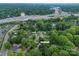 Drone shot of the neighborhood offering quick access to highways, nearby towns, and wooded areas at 4920 Raymond Pl, Charlotte, NC 28205