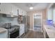 Stylish kitchen with stainless steel appliances and sleek cabinetry at 4920 Raymond Pl, Charlotte, NC 28205