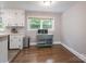 Cozy kitchen with white cabinets and hardwood floors at 4920 Raymond Pl, Charlotte, NC 28205