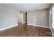 Light-filled living area with hardwood floors and neutral paint at 4920 Raymond Pl, Charlotte, NC 28205