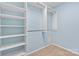 Walk-in closet features shelving, built-ins, carpet, and ample storage space at 505 2Nd Street Ne Pl # C4, Conover, NC 28613