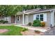 Charming front entrance with a walkway, landscaped bushes, and a welcoming covered porch at 505 2Nd Street Ne Pl # C4, Conover, NC 28613