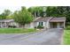 Well-maintained home with a front yard, tree, neutral siding, and convenient carport at 505 2Nd Street Ne Pl # C4, Conover, NC 28613