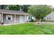 Home's lovely curb appeal featuring well-kept front yard and decorative tree at 505 2Nd Street Ne Pl # C4, Conover, NC 28613