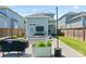 Backyard featuring a patio with outdoor seating, lighting, barbecue and privacy fence at 507 E Main St, Rock Hill, SC 29730