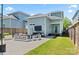 Backyard view with outdoor seating, outdoor television, and privacy fencing at 507 E Main St, Rock Hill, SC 29730