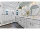 Bright bathroom featuring double vanity, modern finishes, and large glass walk-in shower at 507 E Main St, Rock Hill, SC 29730