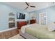 Comfortable bedroom with modern furniture, hardwood floors, and a view of the en-suite bathroom at 507 E Main St, Rock Hill, SC 29730