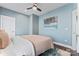 Comfortable bedroom filled with natural light and a stylish ceiling fan at 507 E Main St, Rock Hill, SC 29730