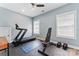This exercise room has a treadmill, yoga mat, weights, and weight training bench at 507 E Main St, Rock Hill, SC 29730