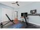 This exercise room has a treadmill, yoga mat, weights, and weight training bench at 507 E Main St, Rock Hill, SC 29730