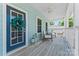 Inviting front porch featuring stylish seating and a decorative wreath on the front door at 507 E Main St, Rock Hill, SC 29730