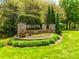 Stone community sign for Hollister with landscaping and greenery at 525 Chase Prairie Ln, Waxhaw, NC 28173
