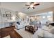 Spacious living room showcases an open floor plan connecting to the modern kitchen at 525 Chase Prairie Ln, Waxhaw, NC 28173