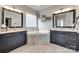 Elegant bathroom with dual vanities and a luxurious soaking tub at 525 Chase Prairie Ln, Waxhaw, NC 28173