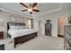 Comfortable main bedroom with a neutral color palette and plenty of natural light at 525 Chase Prairie Ln, Waxhaw, NC 28173