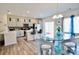 Eat-in kitchen with modern appliances, island seating, and natural light at 525 San Marco Dr, Gastonia, NC 28056