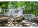 Beautifully landscaped home with a white exterior, and a well-manicured front yard at 530 W Franklin St, Salisbury, NC 28144