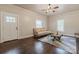 Inviting living room with hardwood floors, neutral walls, and a classic-style sofa at 530 W Franklin St, Salisbury, NC 28144
