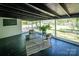 Screened porch with black ceiling, white walls, and view of the outdoors at 530 W Franklin St, Salisbury, NC 28144
