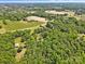 Lush, green trees and spacious lots characterize this aerial view of country living at its finest at 5317 Friendly Baptist Ch Rd, Indian Trail, NC 28079
