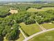 Lush property with wooded areas and open fields at 5317 Friendly Baptist Ch Rd, Indian Trail, NC 28079