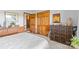 Bedroom features multiple closets, hardwood-look doors, and neutral decor at 5317 Friendly Baptist Ch Rd, Indian Trail, NC 28079