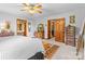 Bright bedroom boasts carpet floors and two open doorways to other rooms at 5317 Friendly Baptist Ch Rd, Indian Trail, NC 28079