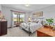 Bedroom with a metal frame bed and view from the window at 5317 Friendly Baptist Ch Rd, Indian Trail, NC 28079