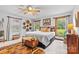 Beautiful bedroom with a large bed, natural light, and stylish furnishings at 5317 Friendly Baptist Ch Rd, Indian Trail, NC 28079