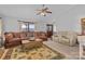 Comfortable living room with large sofas, rug, and natural light at 5317 Friendly Baptist Ch Rd, Indian Trail, NC 28079