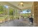 Enjoy the outdoors from this cozy covered porch with brick accent wall and relaxing backyard views at 5317 Friendly Baptist Ch Rd, Indian Trail, NC 28079