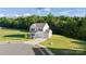 Scenic aerial view of a charming home surrounded by trees and lush green space at 548 Dutch White Dr, Clover, SC 29710
