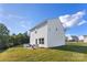 Spacious backyard with a patio and manicured lawn, offering ample space for outdoor activities and relaxation at 548 Dutch White Dr, Clover, SC 29710