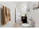 Bright bathroom featuring a vanity, toilet, and neutral colors, offering a clean and inviting atmosphere at 548 Dutch White Dr, Clover, SC 29710