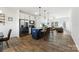 Open kitchen features a large island, stainless steel appliances, and views into the living room at 548 Dutch White Dr, Clover, SC 29710