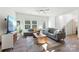 Bright and airy living room with modern sofas, a wooden coffee table, and lots of natural light at 548 Dutch White Dr, Clover, SC 29710