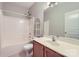 Bathroom featuring a shower and tub combination and a vanity at 5604 Bradford Lake Ln, Charlotte, NC 28269